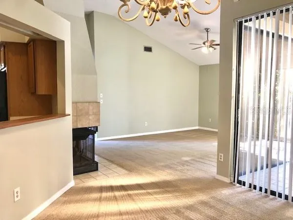 a view of a room with a large window