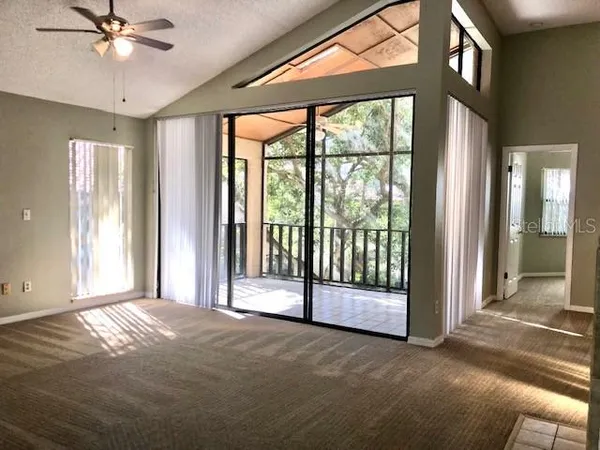 a view of a storage & utility room with a window