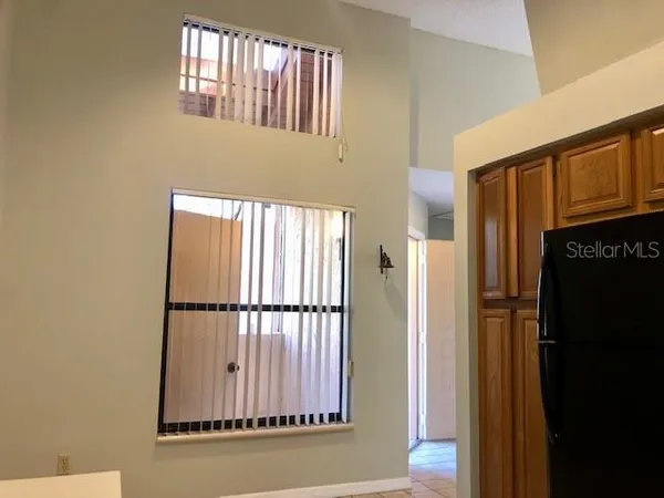 a bathroom with a sink a mirror and a shower