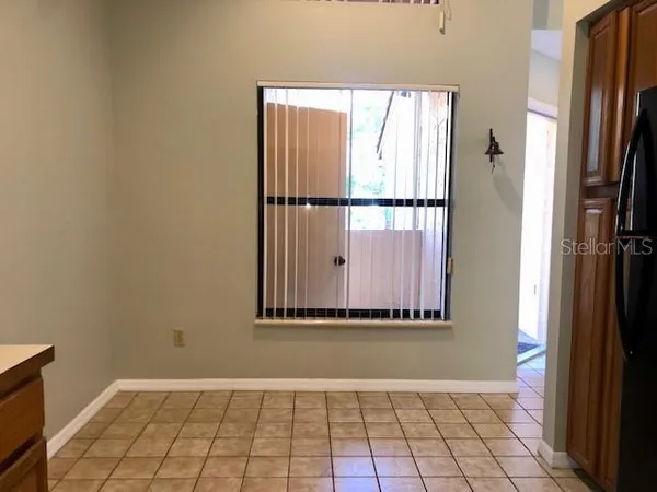 a kitchen with stainless steel appliances granite countertop a sink stove and microwave