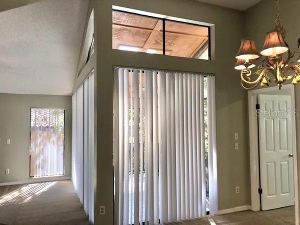 a view of cabinets and wooden floor
