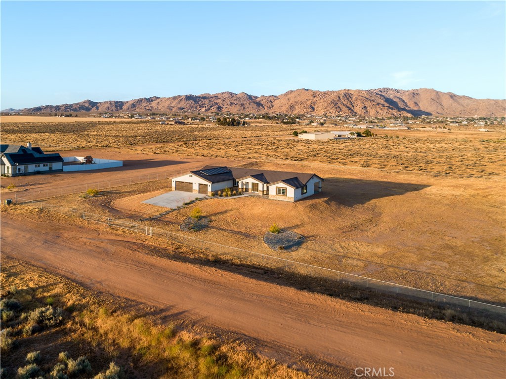 16925 Nanticoke Road Apple Valley, CA 92307 - Photo 84 of 87 a view of an ocean with beach