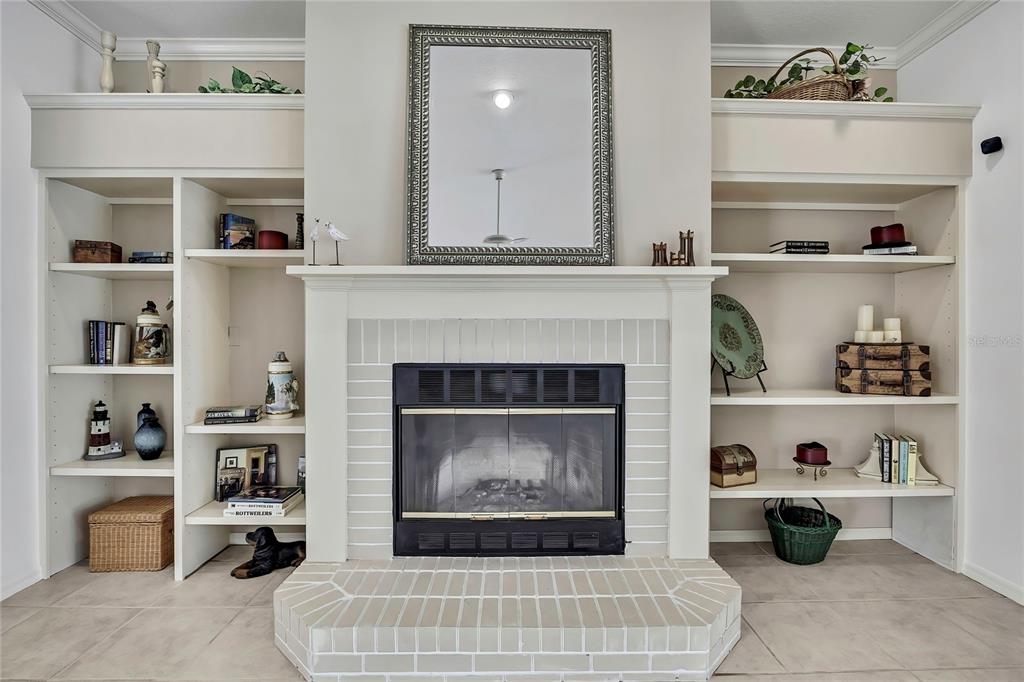 3275 West Daffodil Drive Dunnellon, FL 34433 - Photo 15 of 67 a living room with furniture and a fireplace