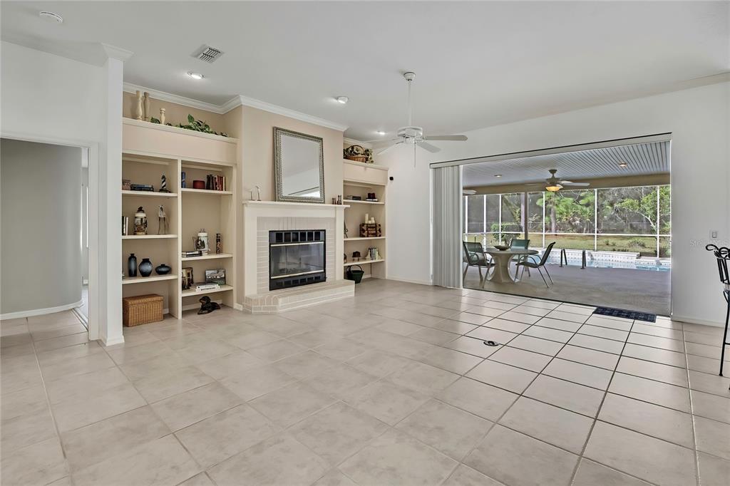 3275 West Daffodil Drive Dunnellon, FL 34433 - Photo 16 of 67 a view of a livingroom with furniture and a large window