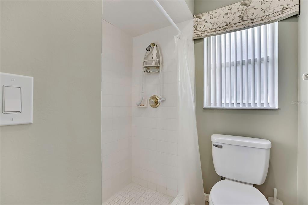 3275 West Daffodil Drive Dunnellon, FL 34433 - Photo 35 of 67 a white toilet sitting next to a bathroom sink