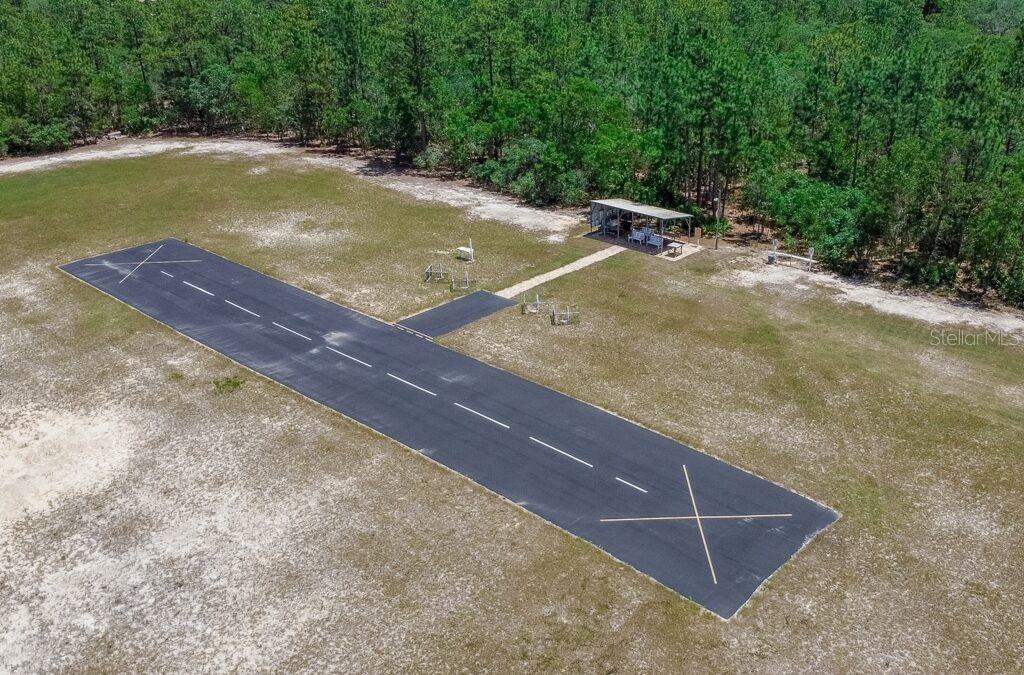 3275 West Daffodil Drive Dunnellon, FL 34433 - Photo 63 of 67 a view of a tennis court