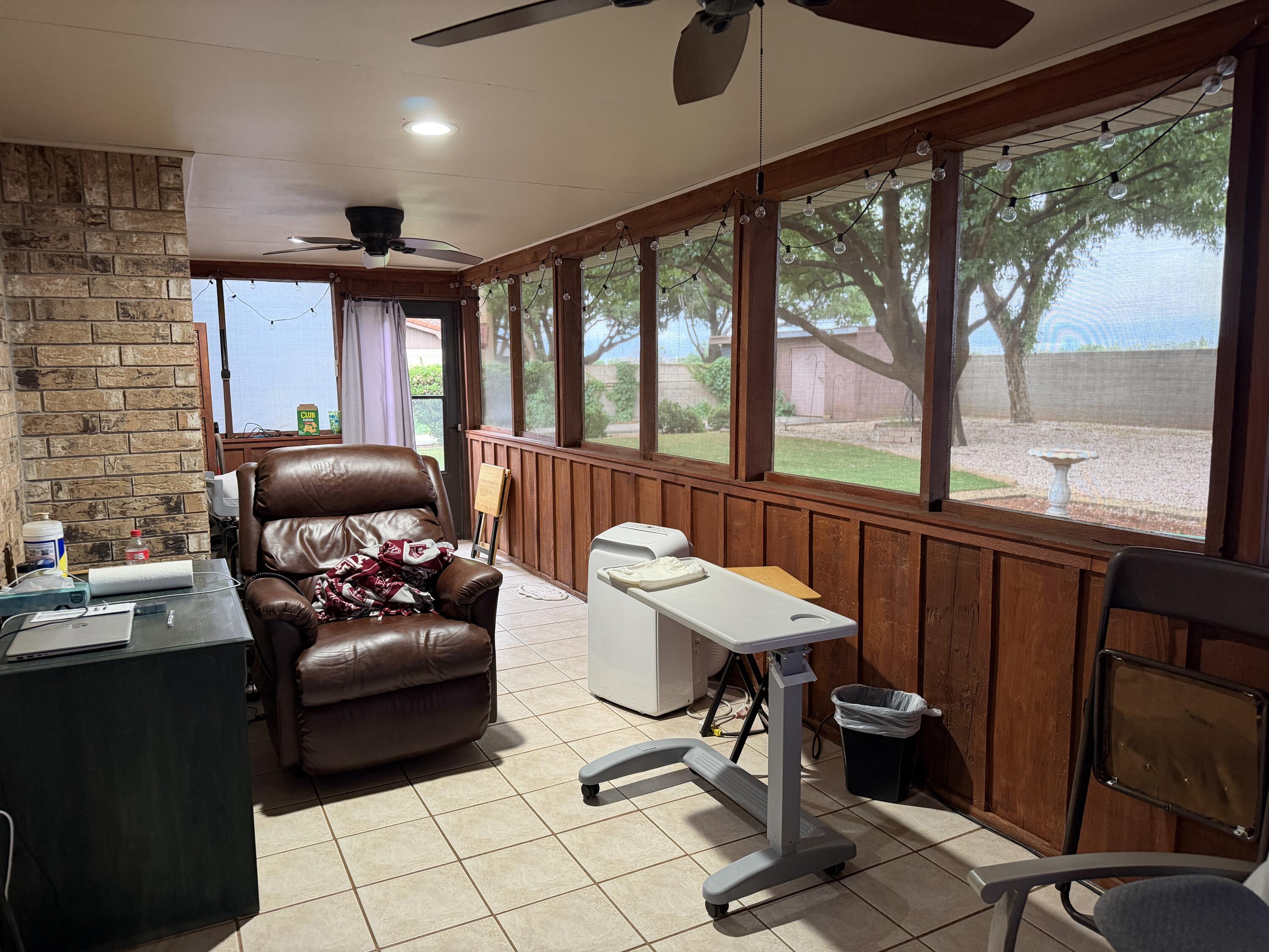 1603 South 8th Street Lamesa, TX 79331 - Photo 26 of 39 a living room with furniture and a large window