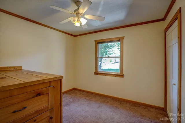 a view of a hallway with closet area