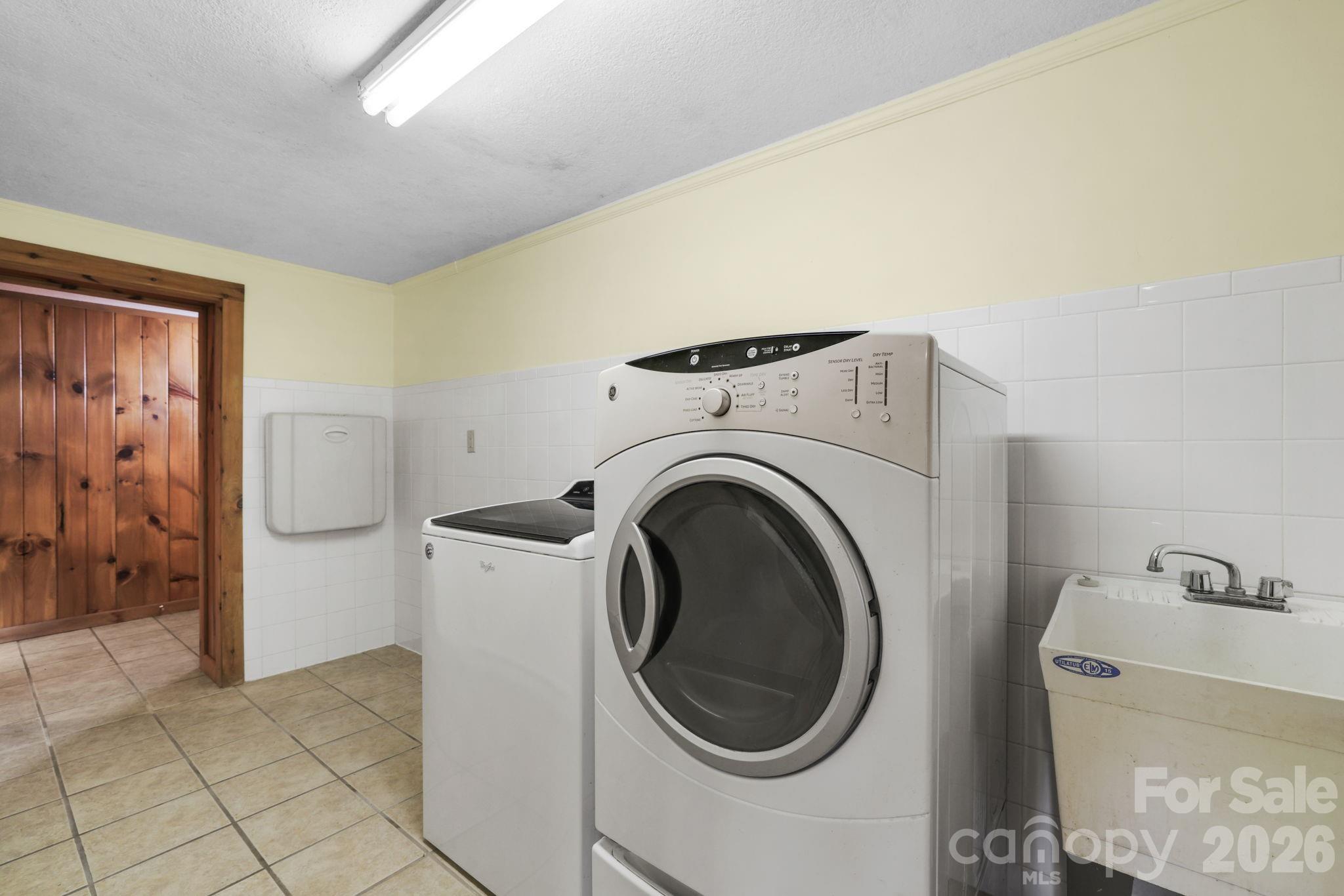1644 West Deep Creek Road Bryson City, NC 28713 - Photo 31 of 47 a utility room with dryer and washer