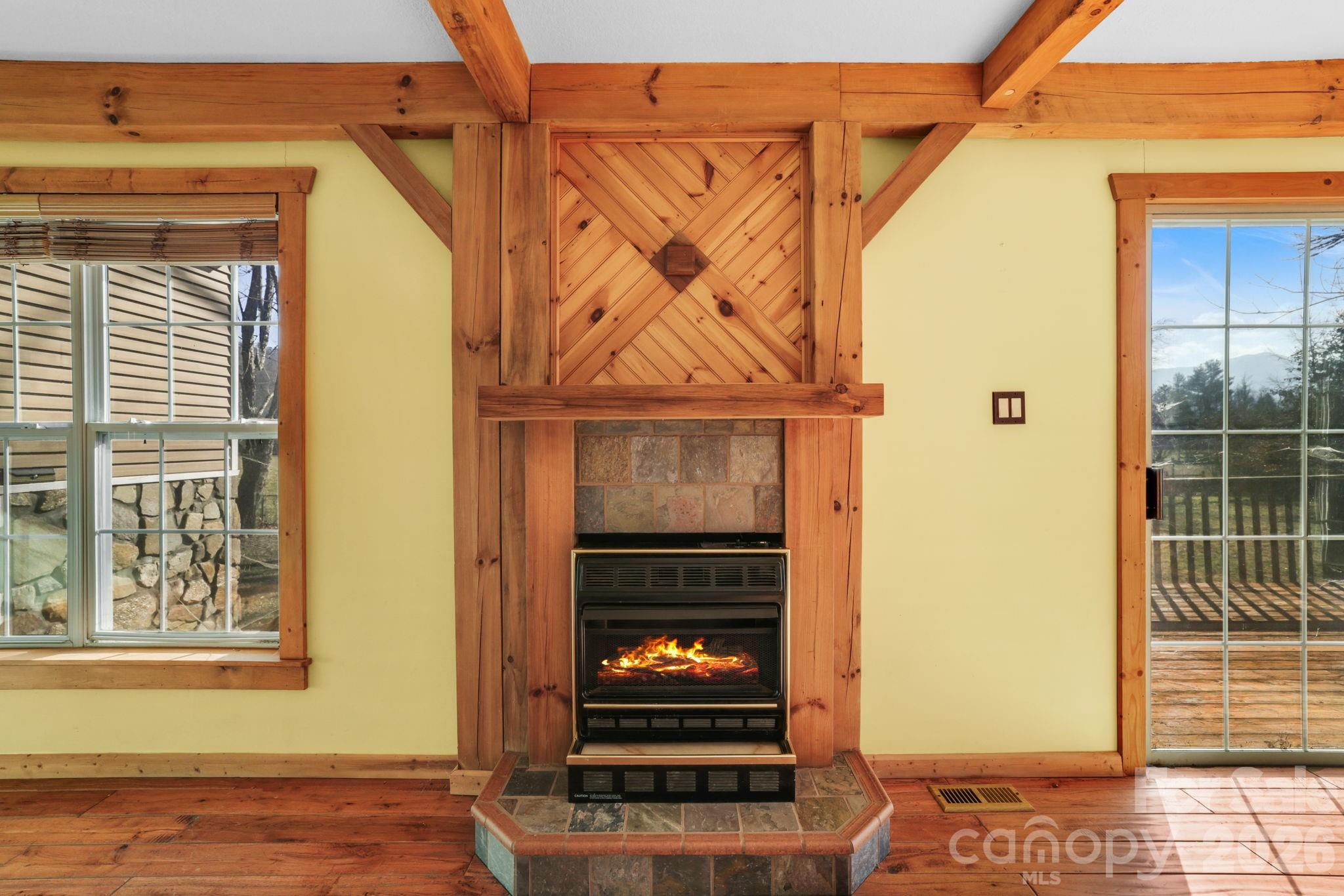 1644 West Deep Creek Road Bryson City, NC 28713 - Photo 6 of 47 a front view of a house with a door and a window