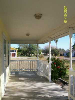 3826 Matteson Street Corpus Christi, TX 78418 - Photo 8 of 8 a view of a porch with furniture and wooden floor