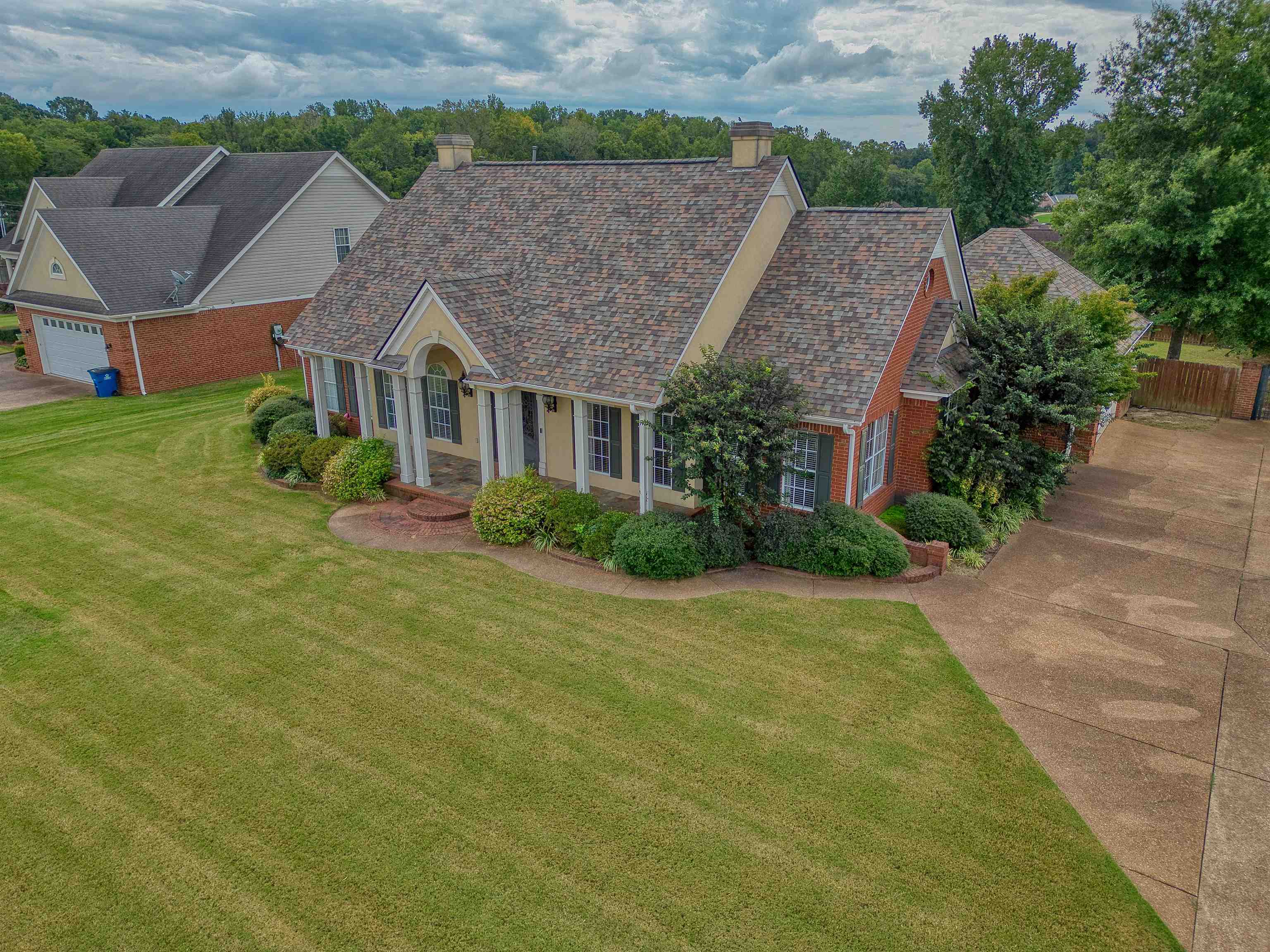 215 Walker Lake Road Atoka, TN 38004 - Photo 3 of 38 View of front of house with a garage and a front yard