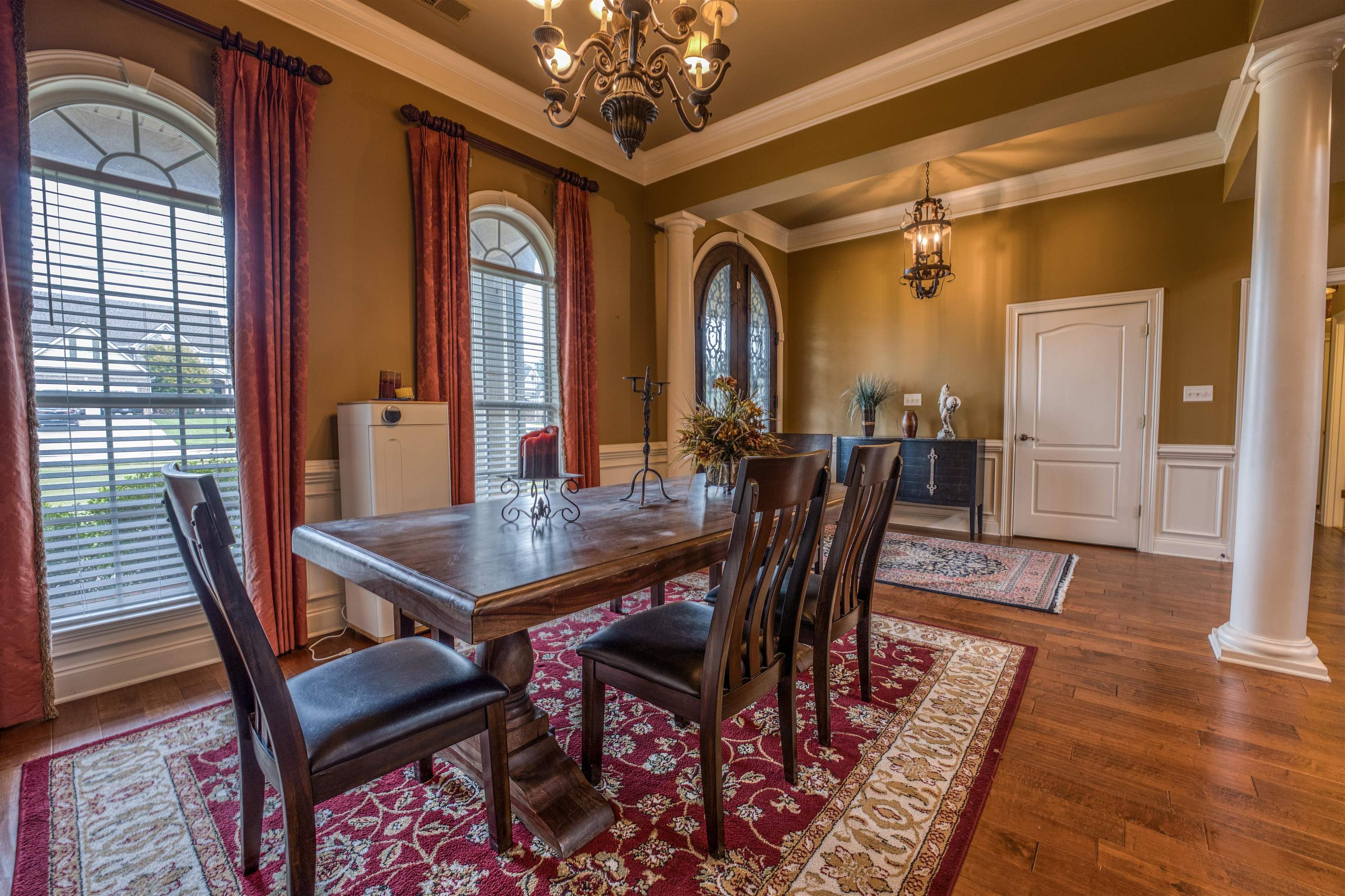 215 Walker Lake Road Atoka, TN 38004 - Photo 9 of 38 Dining space with decorative columns and plenty of natural light