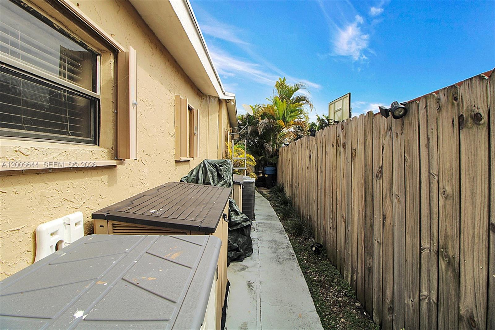 19100 Southwest 125th Avenue Miami, FL 33177 - Photo 38 of 46 a view of a backyard with wooden fence