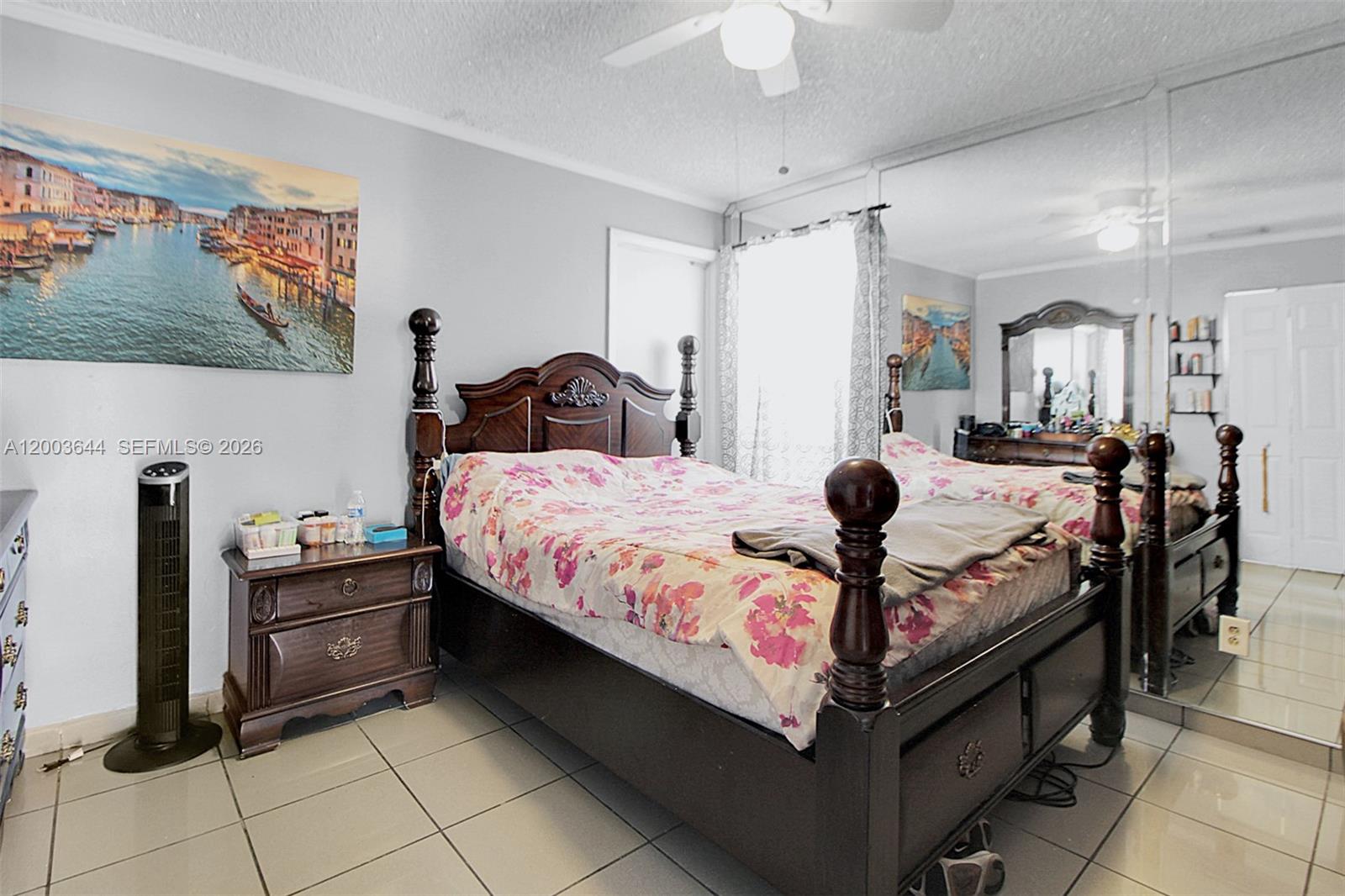 19100 Southwest 125th Avenue Miami, FL 33177 - Photo 44 of 46 a bedroom with a bed and wooden floor