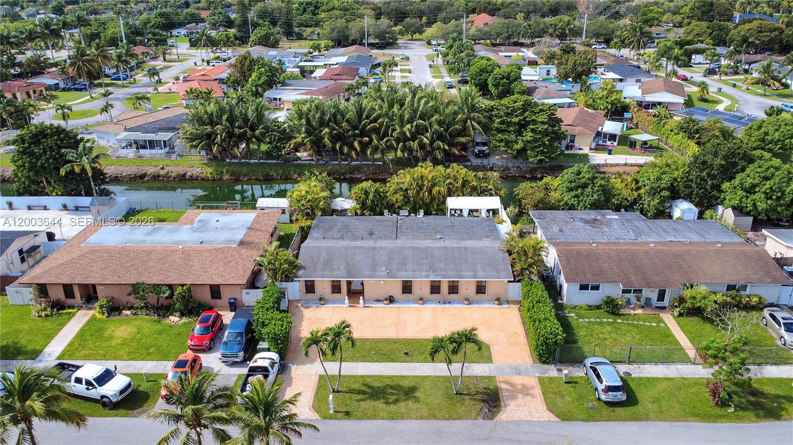 19100 Southwest 125th Avenue Miami, FL 33177 - Photo 8 of 46 an aerial view of multiple houses with yard