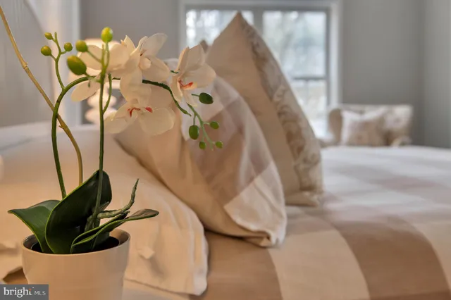 a spacious bathroom with a bathtub and a shower