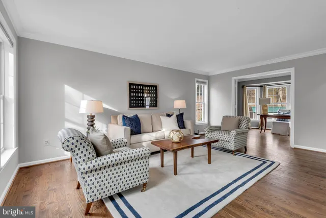 a view of a room with furniture window and wooden floor