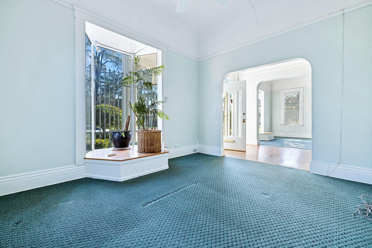 235 North Fulton Street Fresno, CA 93701 - Photo 16 of 43 a view of an empty room with a window