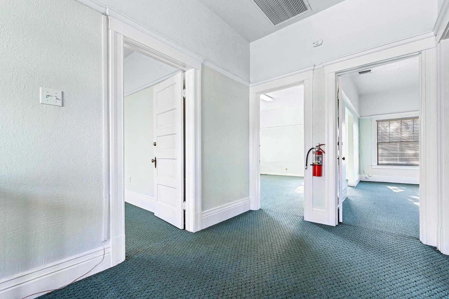 235 North Fulton Street Fresno, CA 93701 - Photo 37 of 43 a view of empty room with front door