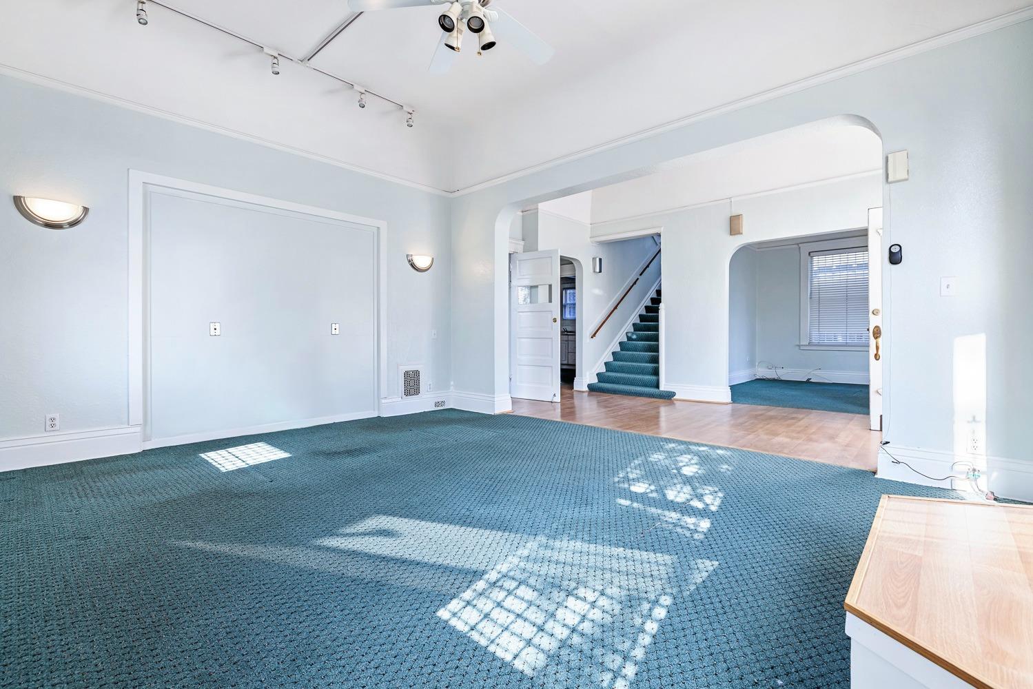 235 North Fulton Street Fresno, CA 93701 - Photo 5 of 43 a view of entryway and hall with a wooden floor