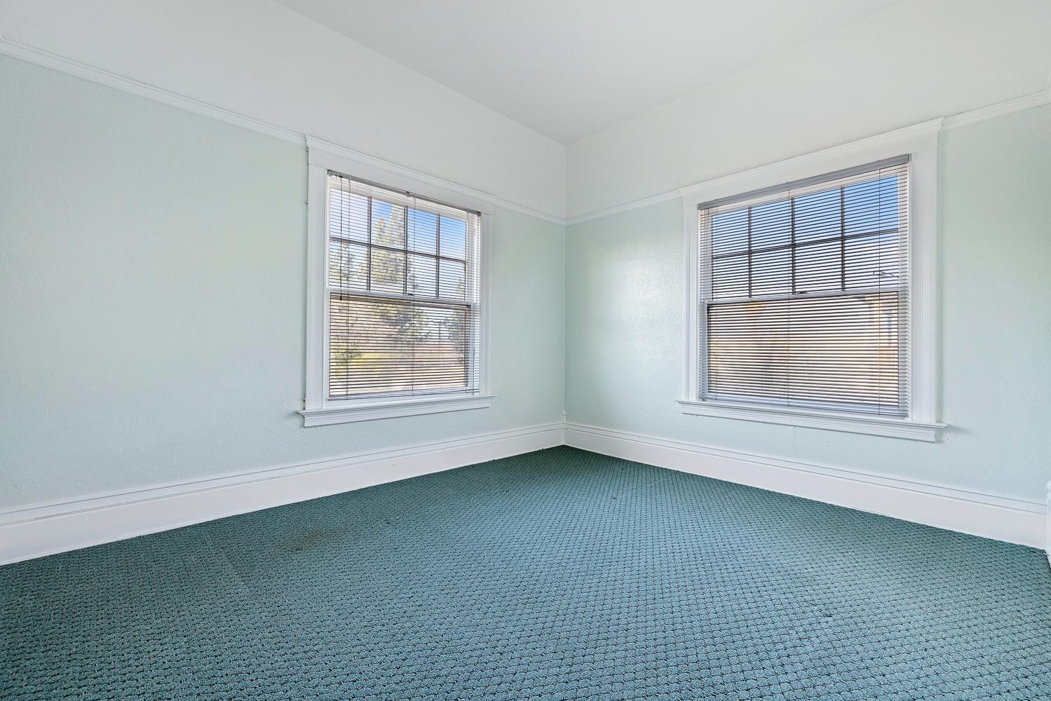 235 North Fulton Street Fresno, CA 93701 - Photo 7 of 43 a view of an empty room with a window