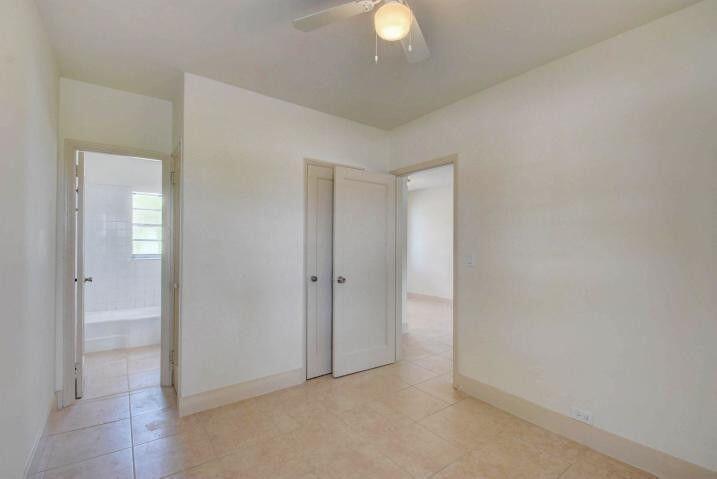 3000 Broadway Avenue, Unit 3 West Palm Beach, FL 33407 - Photo 12 of 19 a view of an empty room and a window