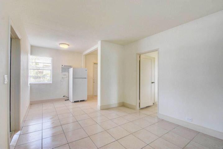 3000 Broadway Avenue, Unit 3 West Palm Beach, FL 33407 - Photo 5 of 19 a view of an empty room and window