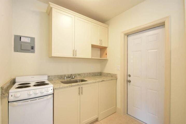 3000 Broadway Avenue, Unit 3 West Palm Beach, FL 33407 - Photo 10 of 19 a utility room with dryer and washer