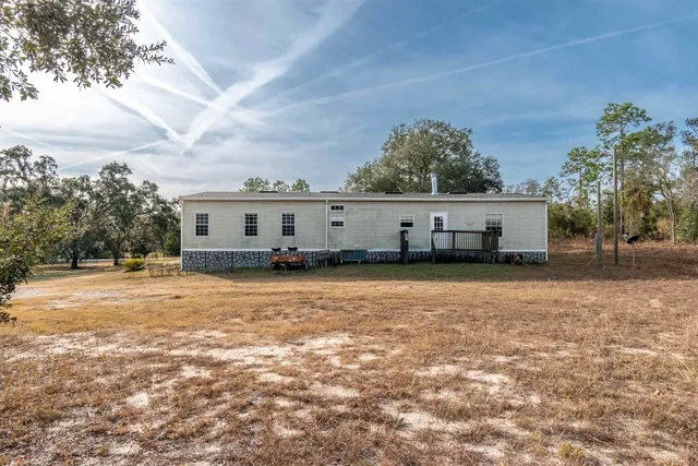 front view of a house with a big yard