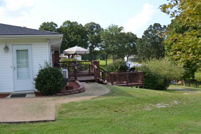 1890 Clydeton Road Waverly, TN 37185 - Photo 15 of 20 Side view of home with deck off back of house