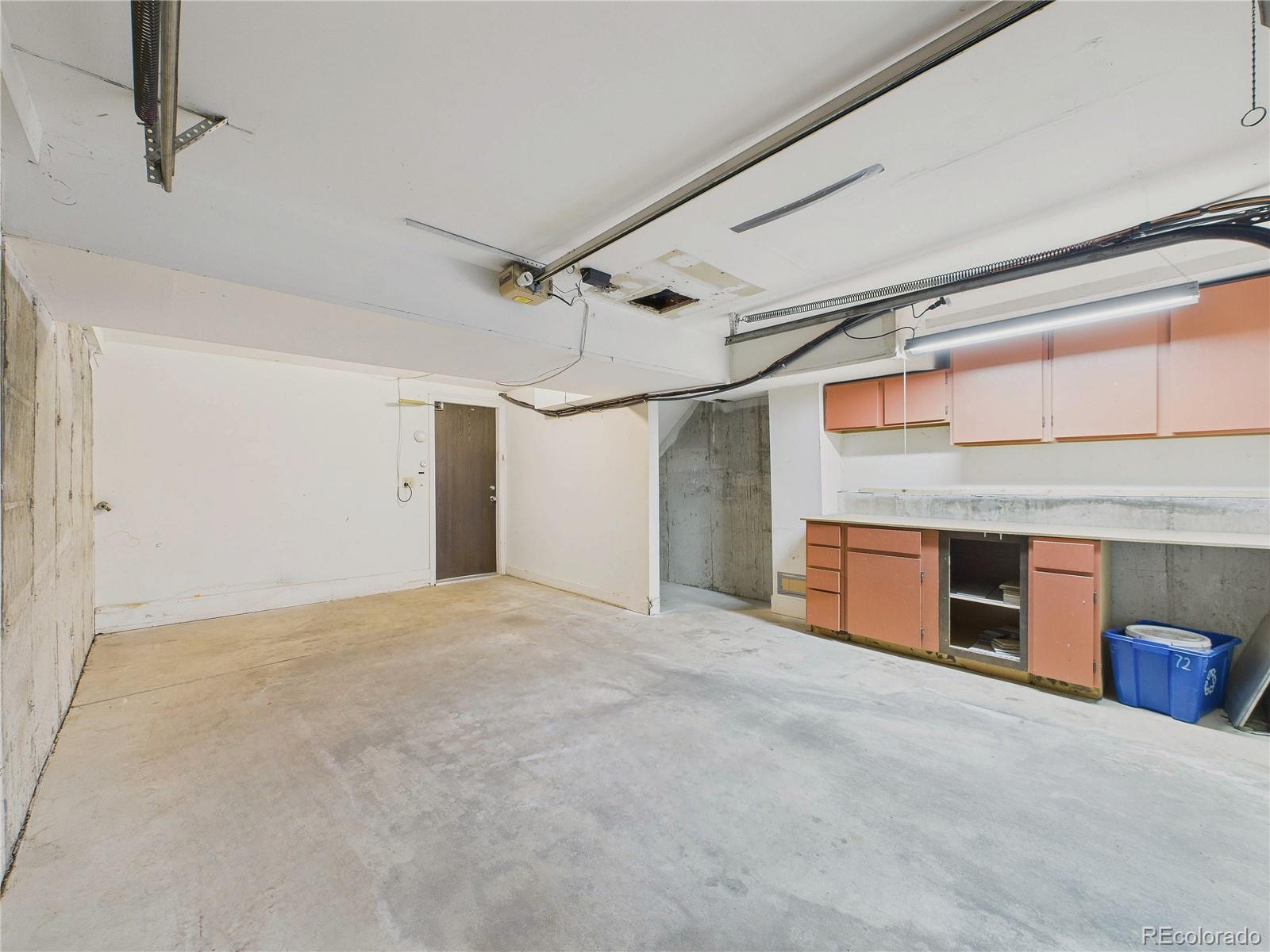 6725 West 84th Way, Unit 72 Arvada, CO 80003 - Photo 13 of 20 a view of an empty room with a fireplace