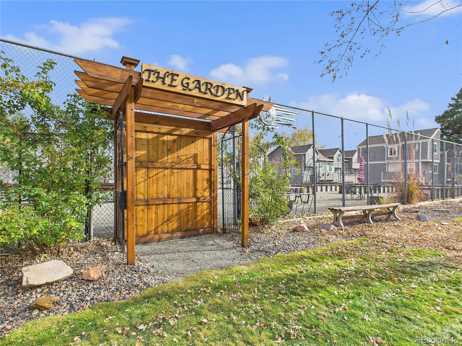6725 West 84th Way, Unit 72 Arvada, CO 80003 - Photo 14 of 20 a view of a house with backyard and sitting area