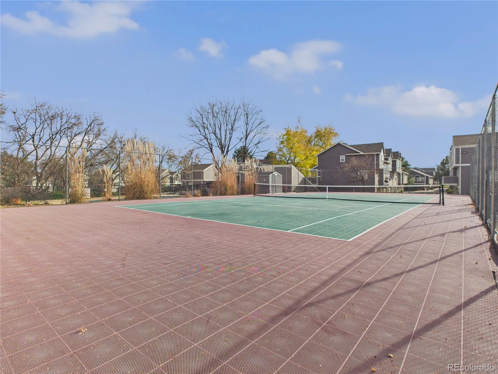 6725 West 84th Way, Unit 72 Arvada, CO 80003 - Photo 15 of 20 a view of building with yard
