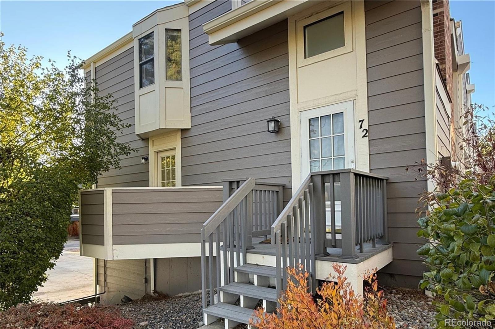 6725 West 84th Way, Unit 72 Arvada, CO 80003 - Photo 9 of 20 a view of two chairs in the balcony