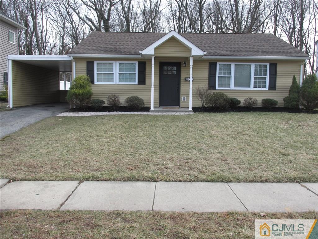 111 Winthrop Road Edison, NJ 08817 - Photo 1 of 10 front view of a house with potted plants