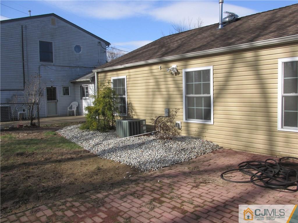 111 Winthrop Road Edison, NJ 08817 - Photo 2 of 10 a front view of a house with garden