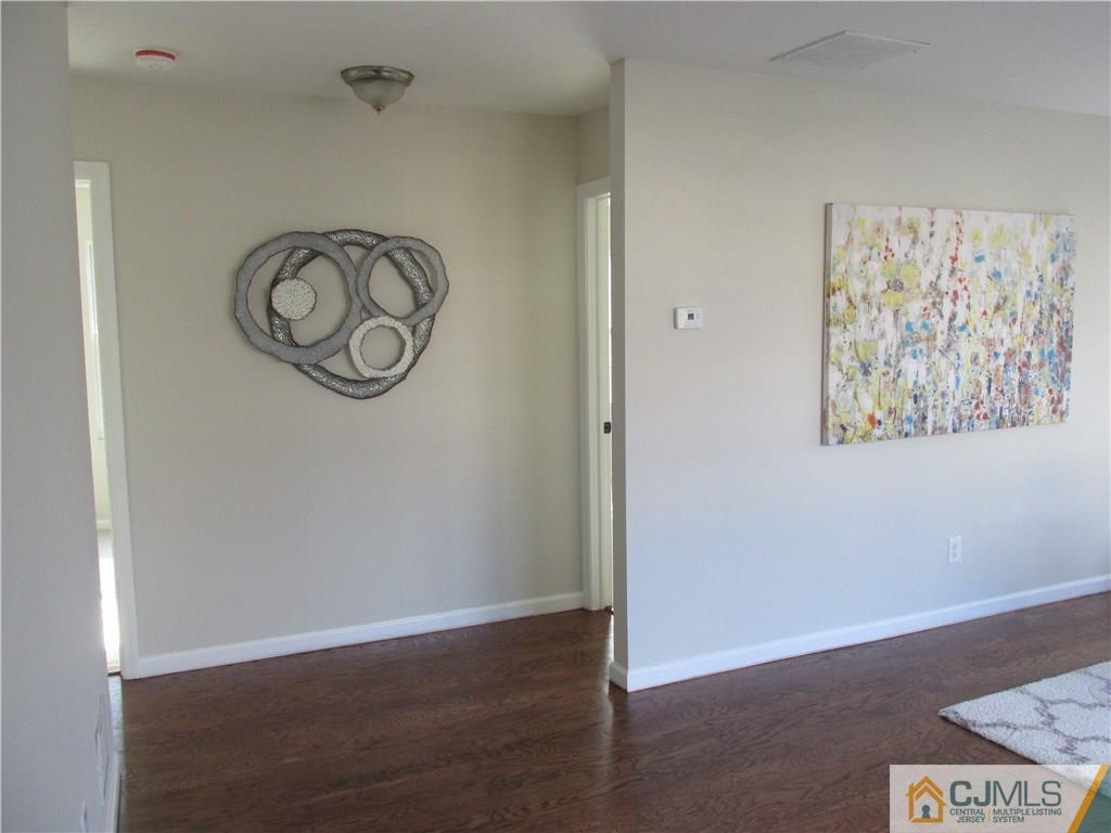 111 Winthrop Road Edison, NJ 08817 - Photo 7 of 10 a view of entryway with wooden floor