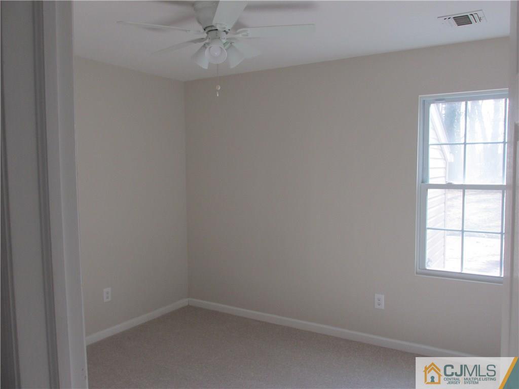 111 Winthrop Road Edison, NJ 08817 - Photo 10 of 10 an empty room with a window