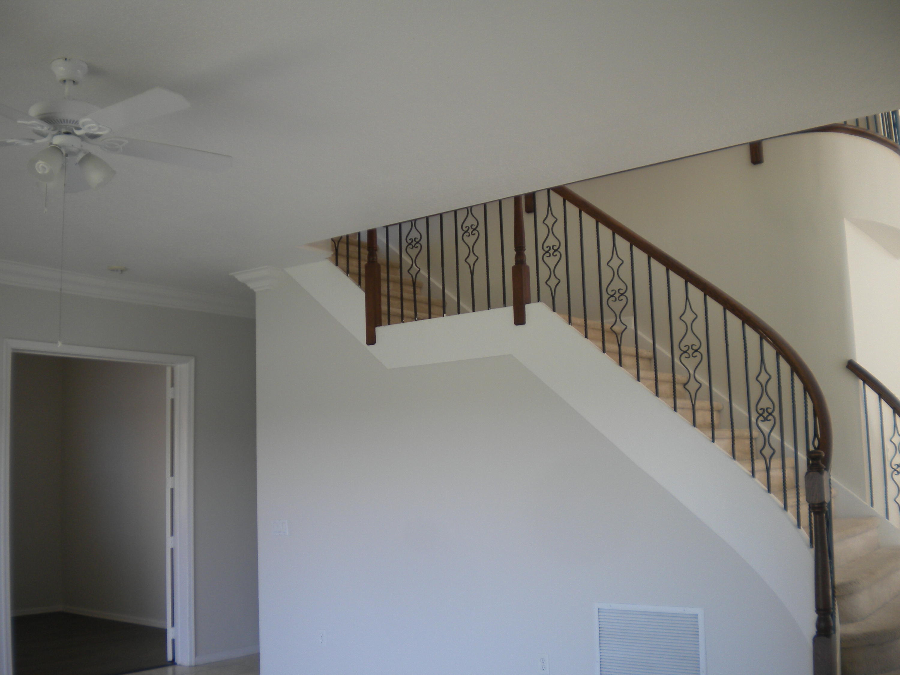 9615 Shepard Place Wellington, FL 33414 - Photo 18 of 46 a view of entryway with wooden floor
