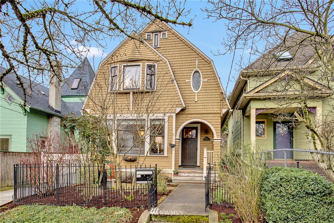 815 20th Avenue South Seattle, WA 98144 - Photo 1 of 33 a front view of a house with a yard