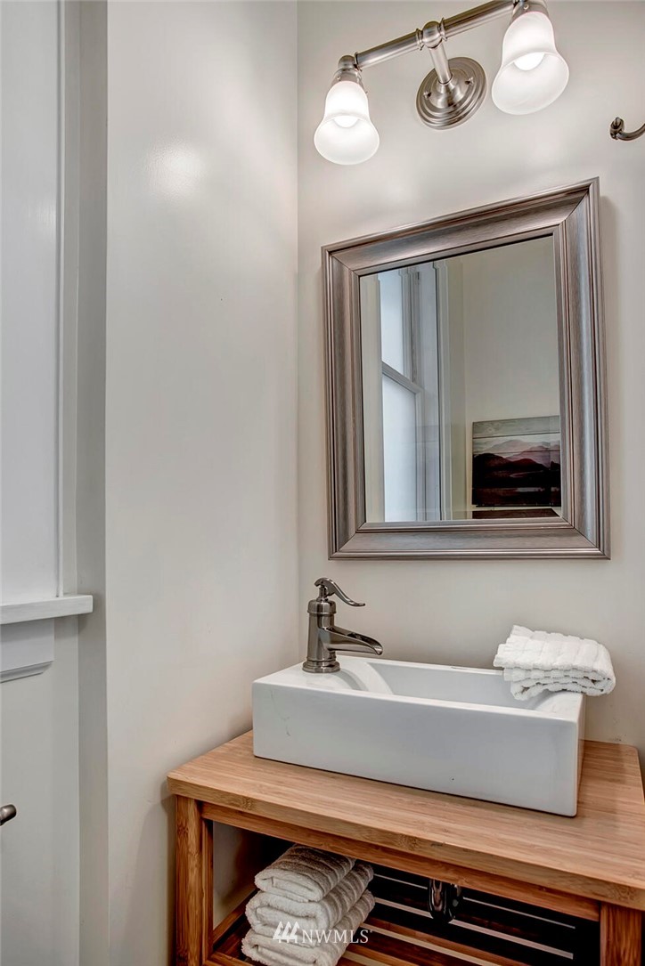 815 20th Avenue South Seattle, WA 98144 - Photo 20 of 33 a bathroom with a sink and a mirror