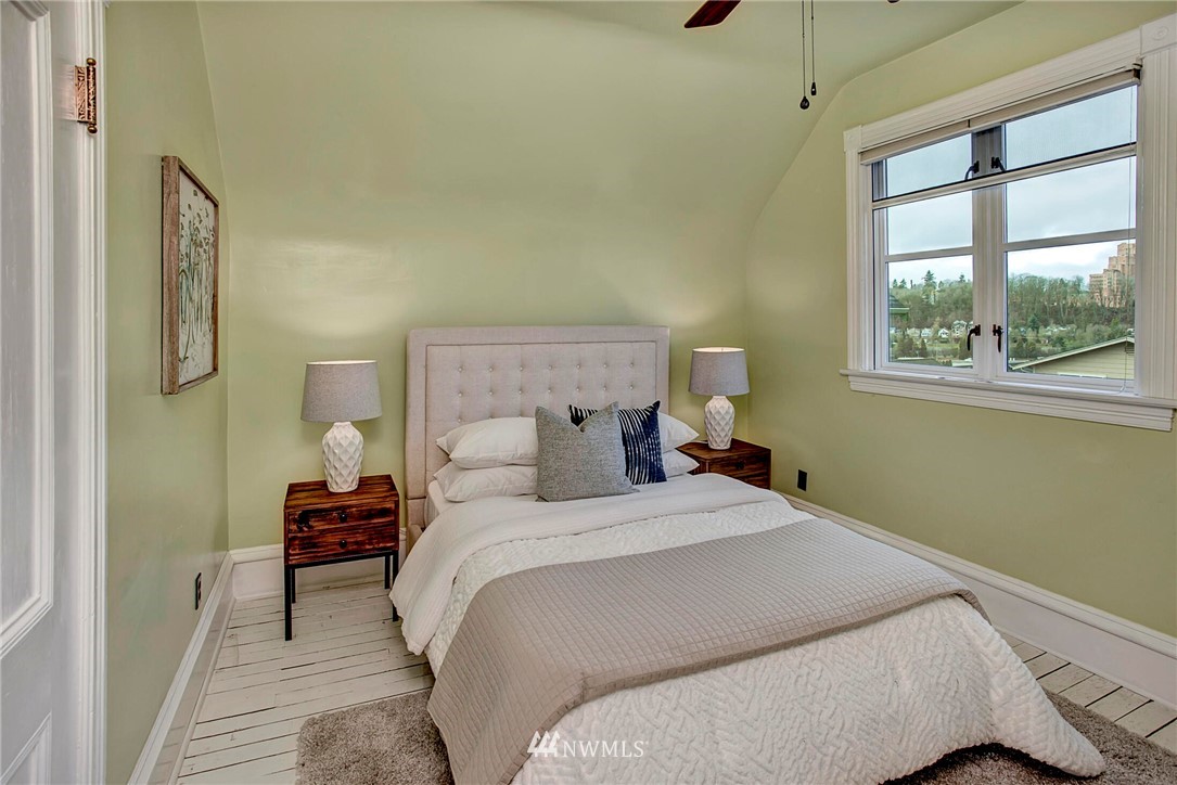 815 20th Avenue South Seattle, WA 98144 - Photo 24 of 33 a bedroom with a bed and a window