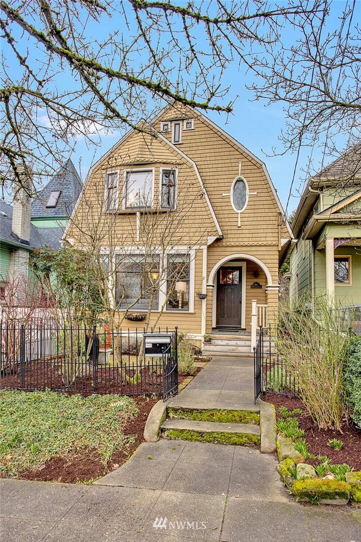 815 20th Avenue South Seattle, WA 98144 - Photo 29 of 33 a front view of a house with a garden