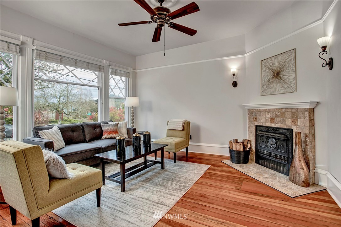 815 20th Avenue South Seattle, WA 98144 - Photo 5 of 33 a living room with furniture and a fireplace