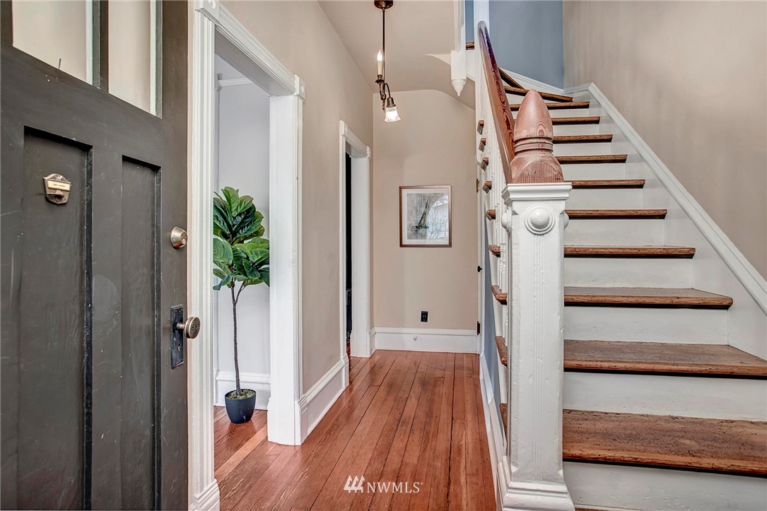 815 20th Avenue South Seattle, WA 98144 - Photo 8 of 33 a view of a hallway with wooden floor and entryway