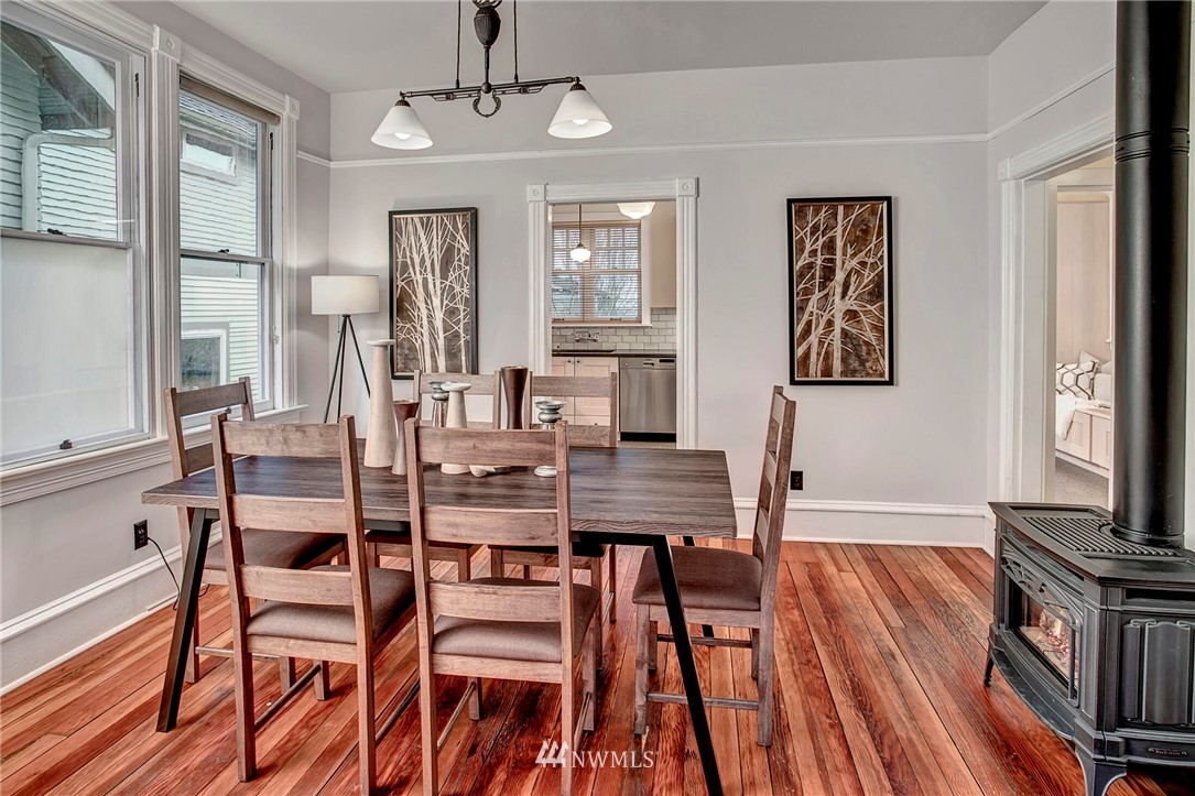815 20th Avenue South Seattle, WA 98144 - Photo 10 of 33 a view of a dining room with furniture window and wooden floor