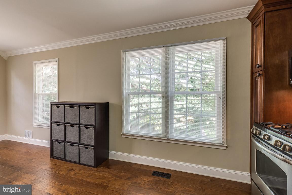 11841 Dunlop Court Reston, VA 20191 - Photo 15 of 30 a view of wooden floor and windows in a room