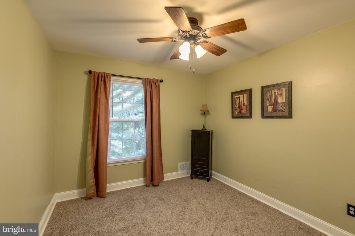11841 Dunlop Court Reston, VA 20191 - Photo 22 of 30 an empty room with windows and fan