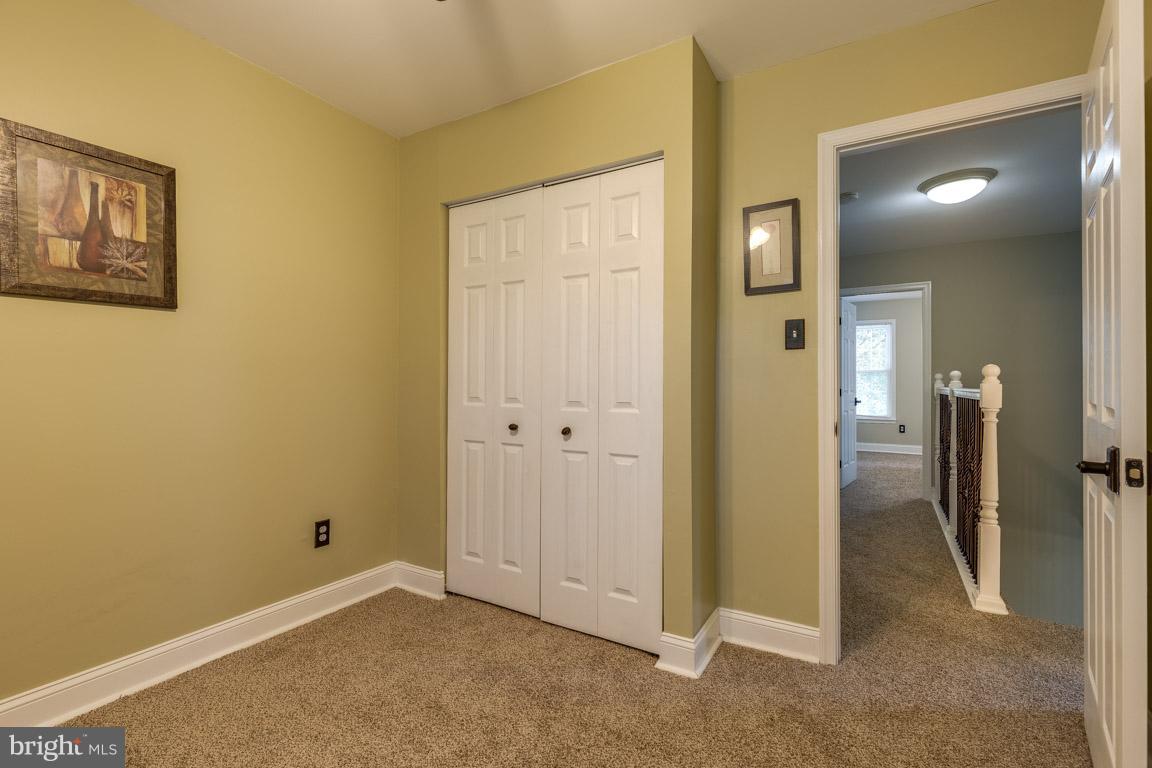 11841 Dunlop Court Reston, VA 20191 - Photo 23 of 30 wooden view of a livingroom with a elevator